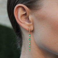 Graduated Pear Cut Emeralds Long Drop Earrings in 14K Gold