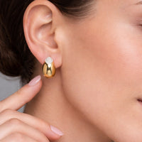 Sleek Oval Diamond Stud Earrings in 14K Yellow Gold
