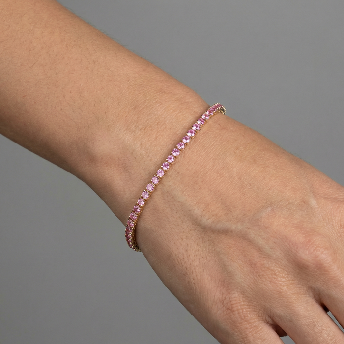 Luxurious Pink Sapphire 14K Yellow Gold Tennis Bracelet