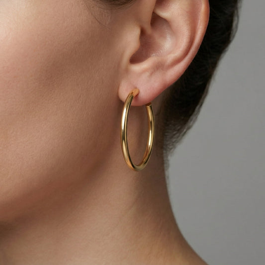 Polished Classic Medium Hoop Earrings in 14K Gold