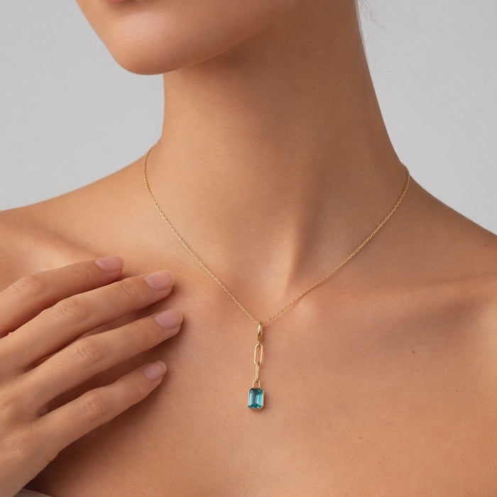 Orbit Blue Topaz Pendant Necklace in 14K Yellow Gold