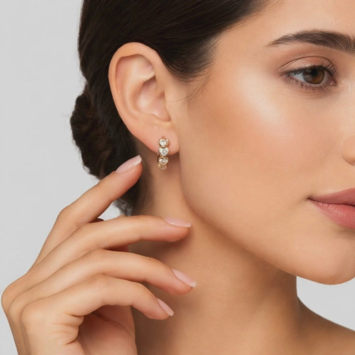 Heart Shape Diamond Huggie Earrings in 14K Yellow Gold