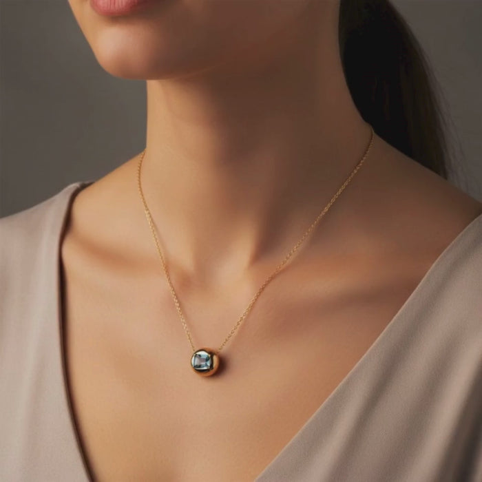 Emerald-Cut Blue Topaz Solitaire Necklace in 14K Yellow Gold