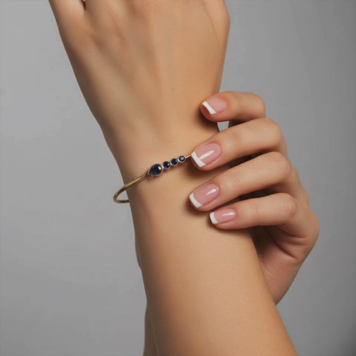 Pear Cut Sapphire Accent Bracelet in 14K Yellow Gold
